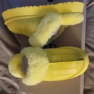 Brand New Yellow Ugg slides. To small